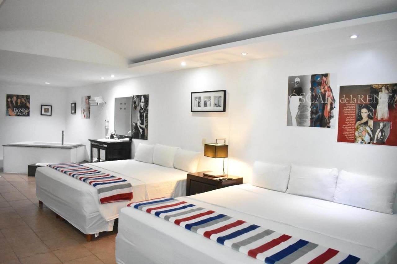 Quarto Duplo Deluxe com 2 Camas de Casal