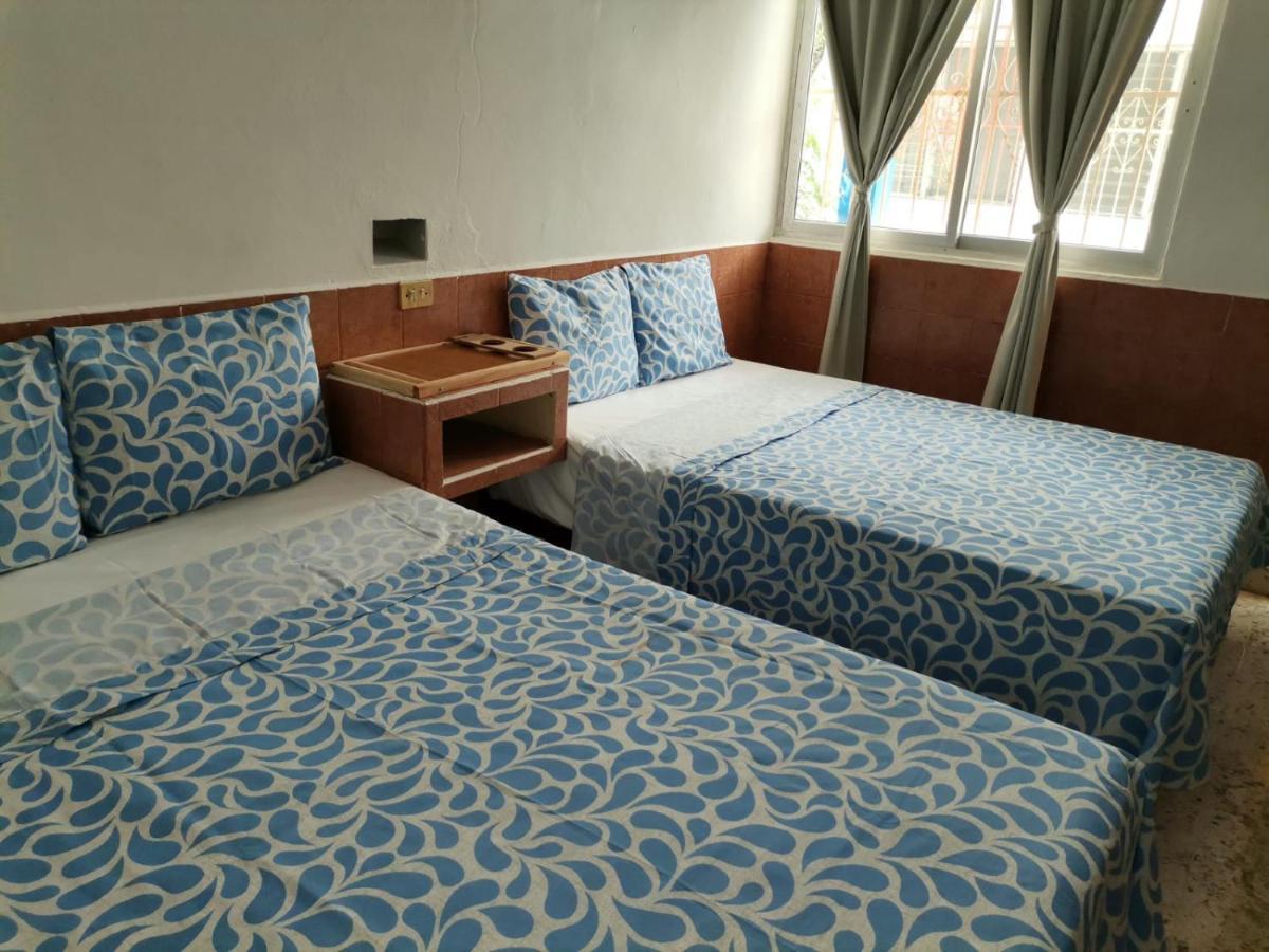 Habitación Estándar con aire acondicionado, vistas al jardín y 2 camas dobles