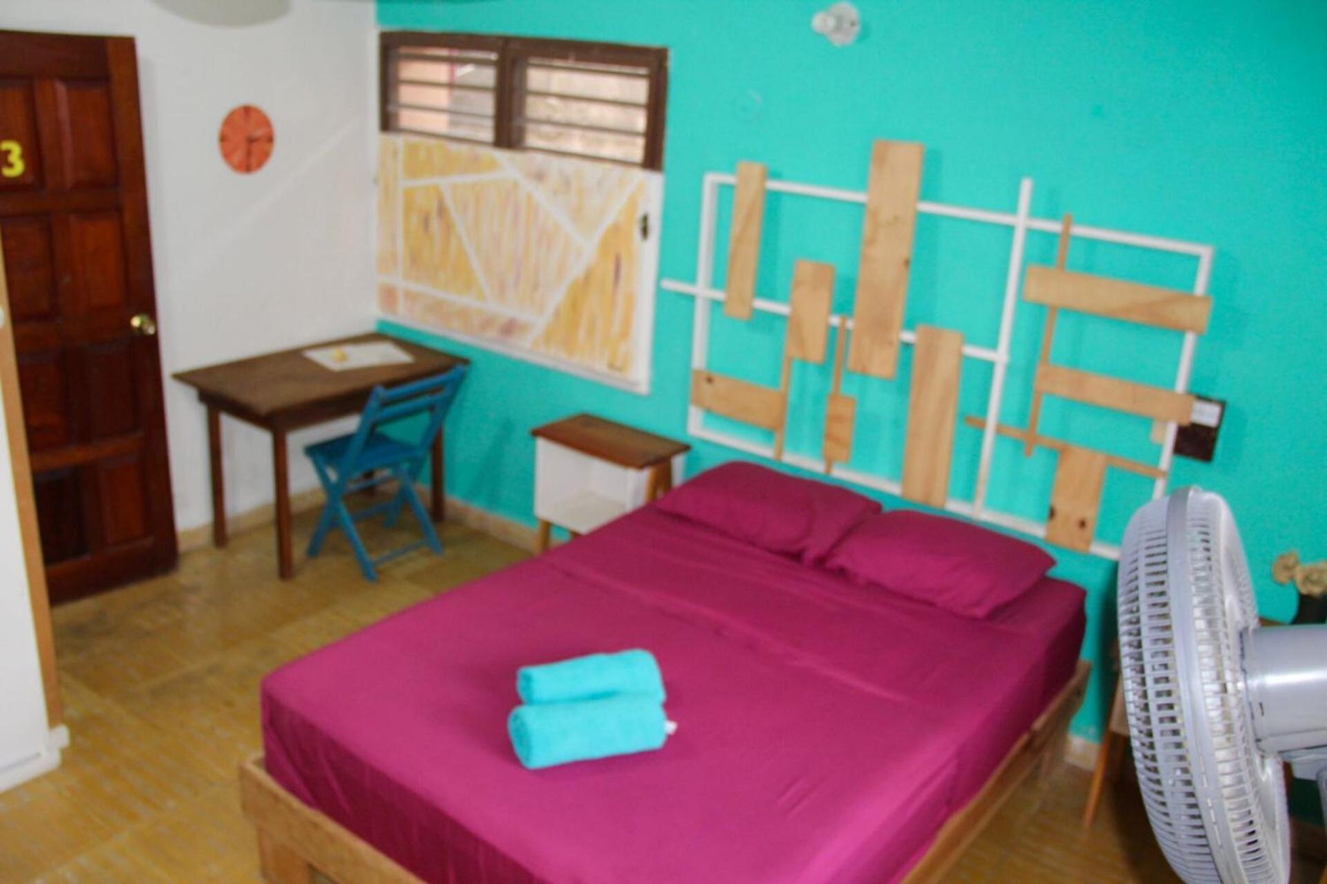 Double room with fans and shared bathroom