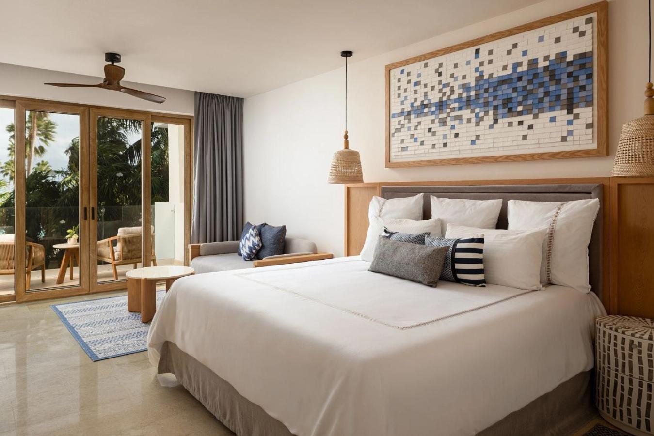Suite Junior con vistas al jardín y cama extragrande